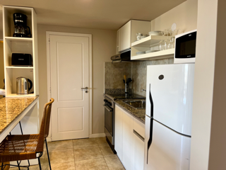 Alojamiento en el centro con vista parcial al lago y con cochera